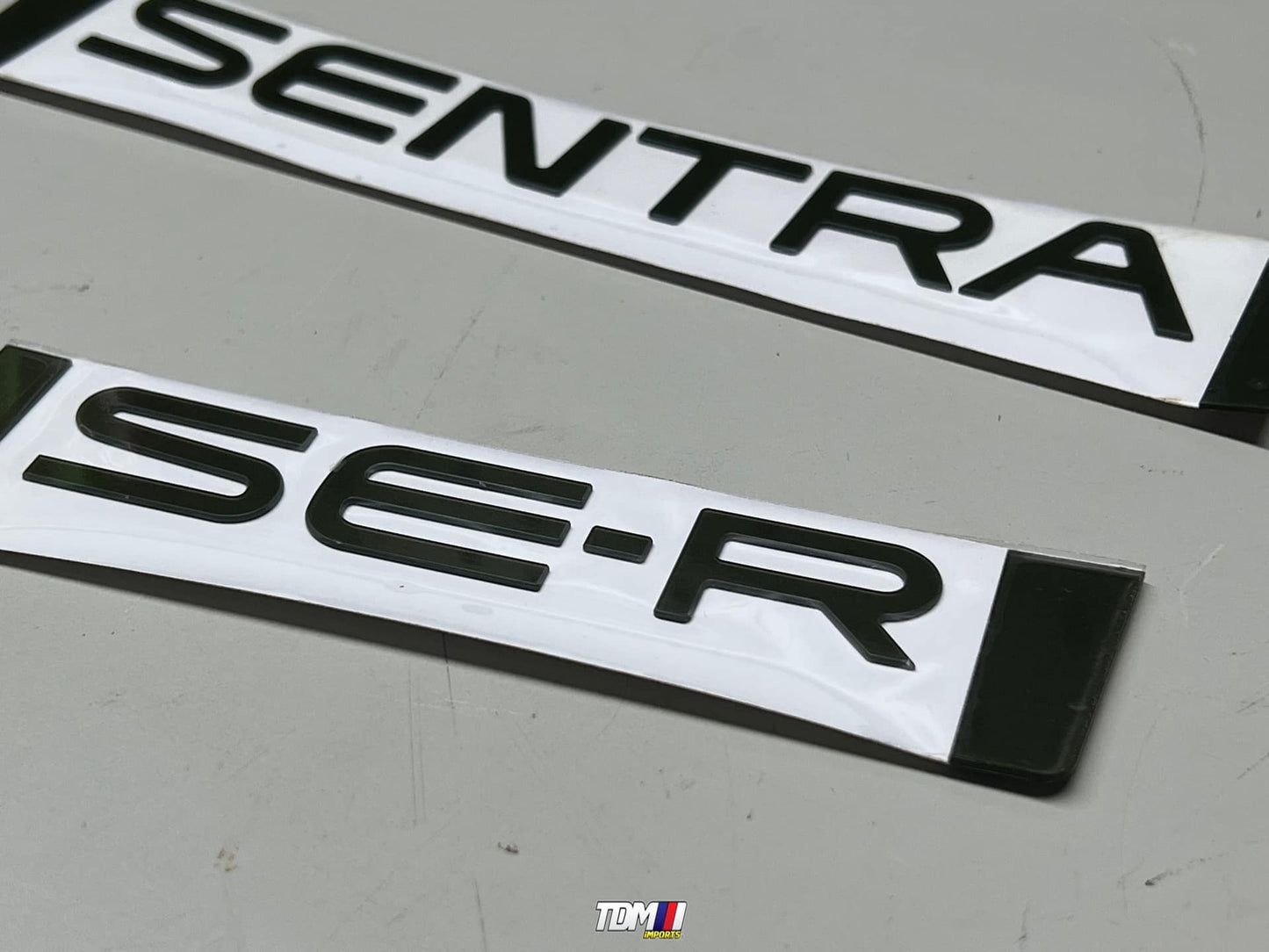 TDMi Reproduction (B13) Sentra and SE-R trunk badge Combo